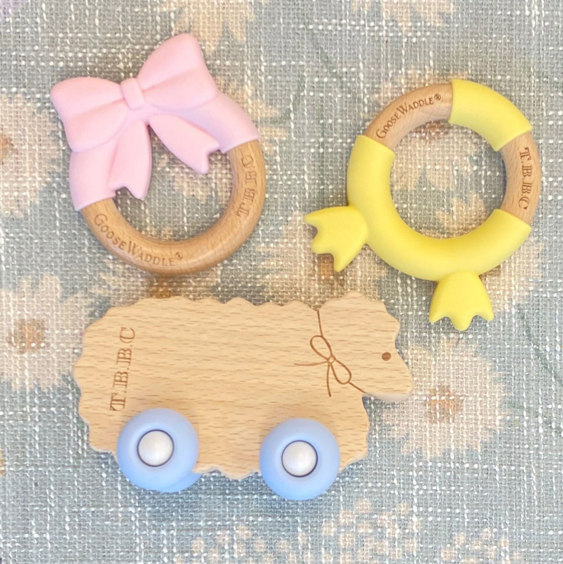 TBBC Sheep with Bow & Blue Wheels Teether